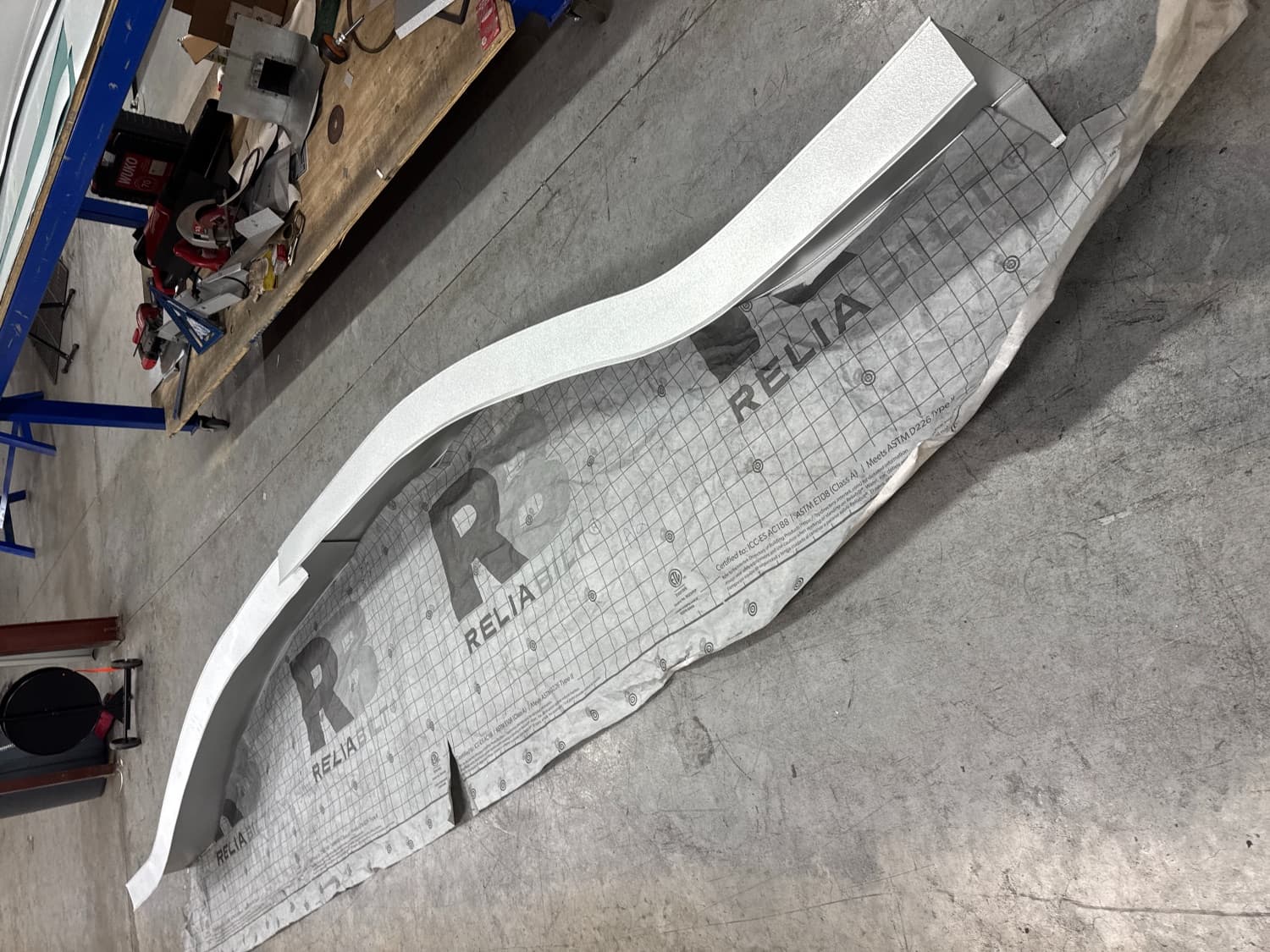 Fabricated metal flashing and trim staged ready for crew will-call pickup